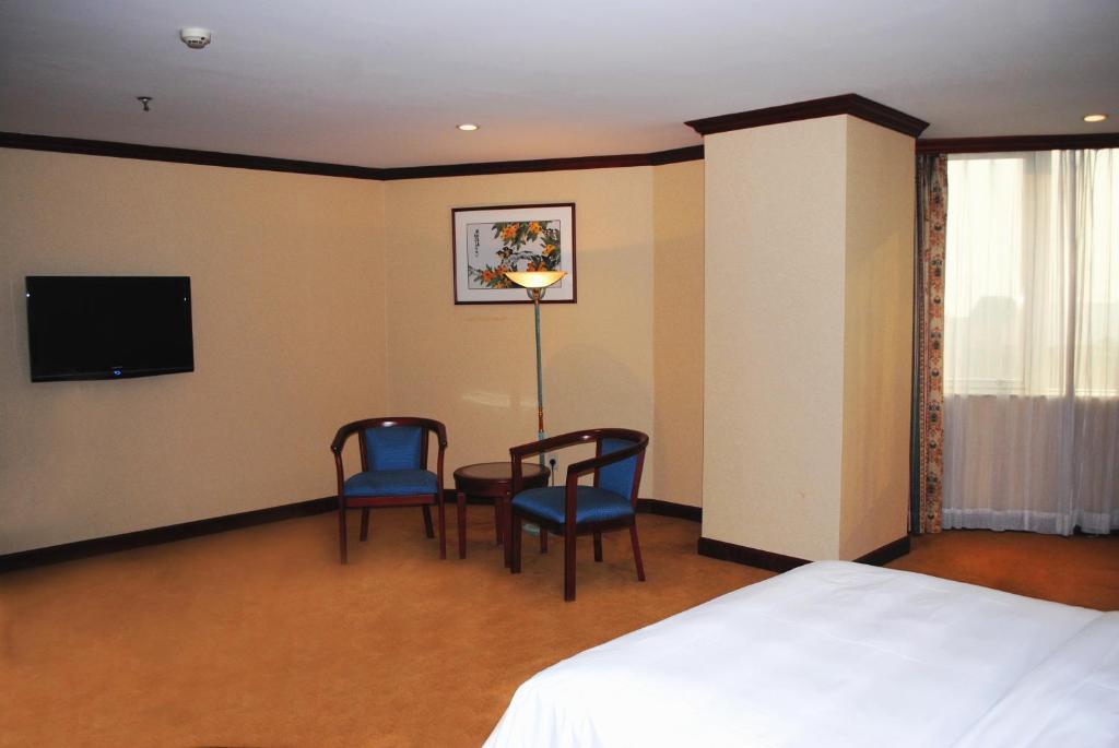 Guangzhou New Century Hotel Szoba fotó