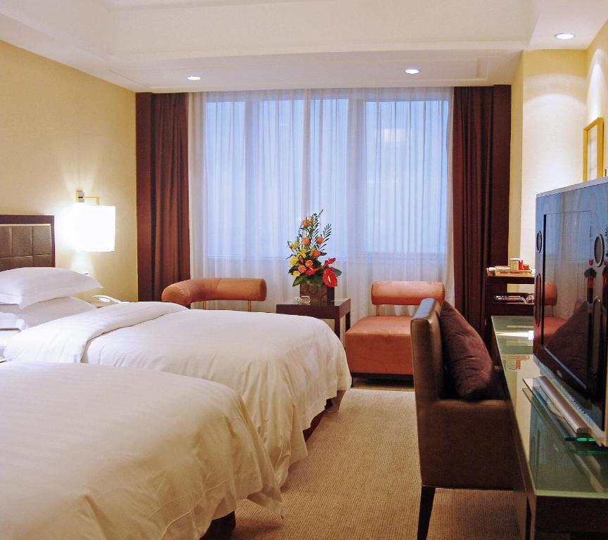 Guangzhou New Century Hotel Szoba fotó